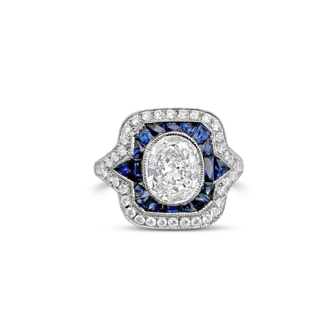 Platinum 1.12ct Oval Diamond and .92ctw Sapphire Estate Ring