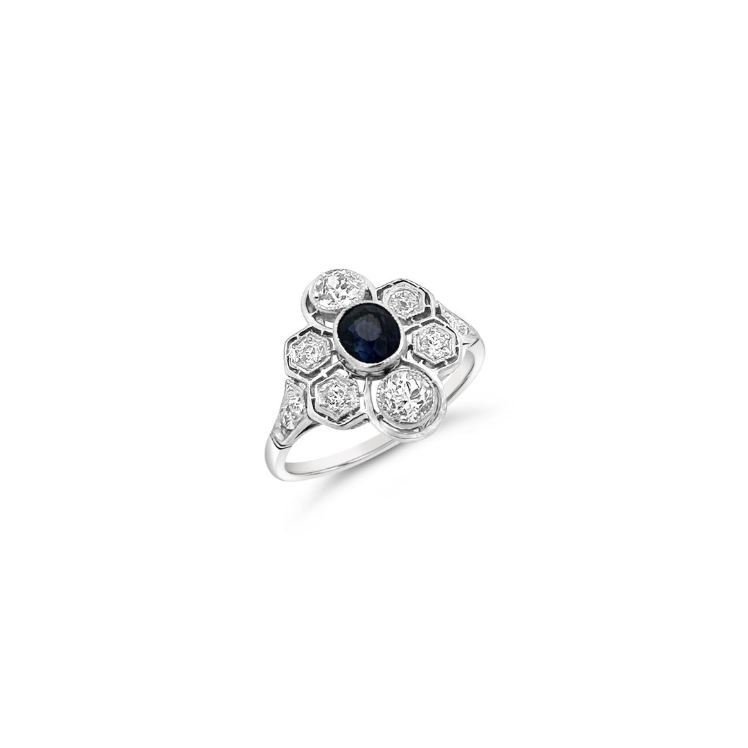 Platinum .65ct Sapphire and .82cts Diamond Flower Estate Ring