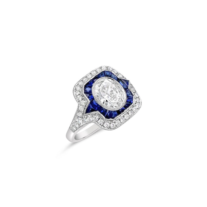 Platinum 1.12ct Oval Diamond and .92ctw Sapphire Estate Ring